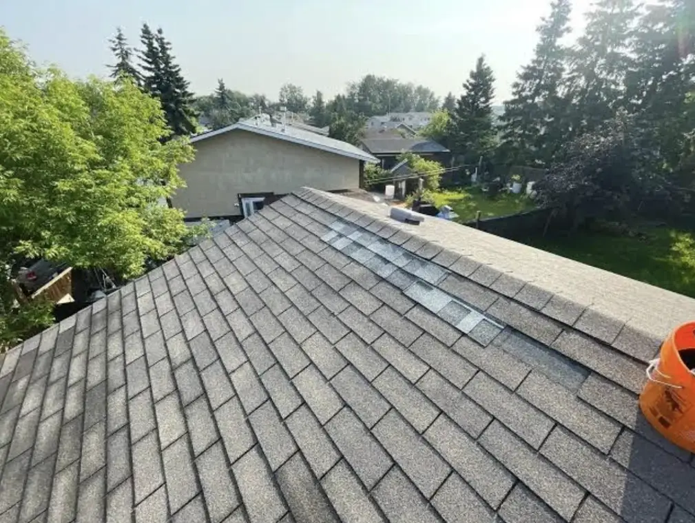 Asphalt shingle roof ridge cap detail from the best Bismarck Roofing Company