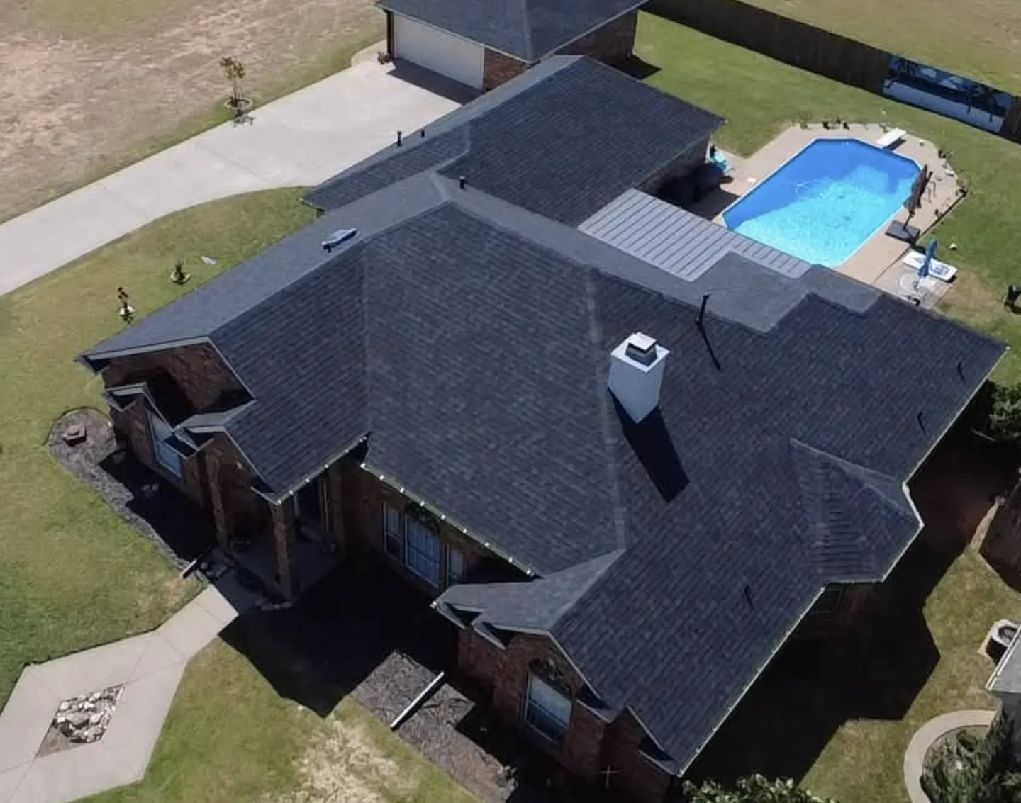 Residential shingle roof installation aerial view in Bismarck, North Dakota