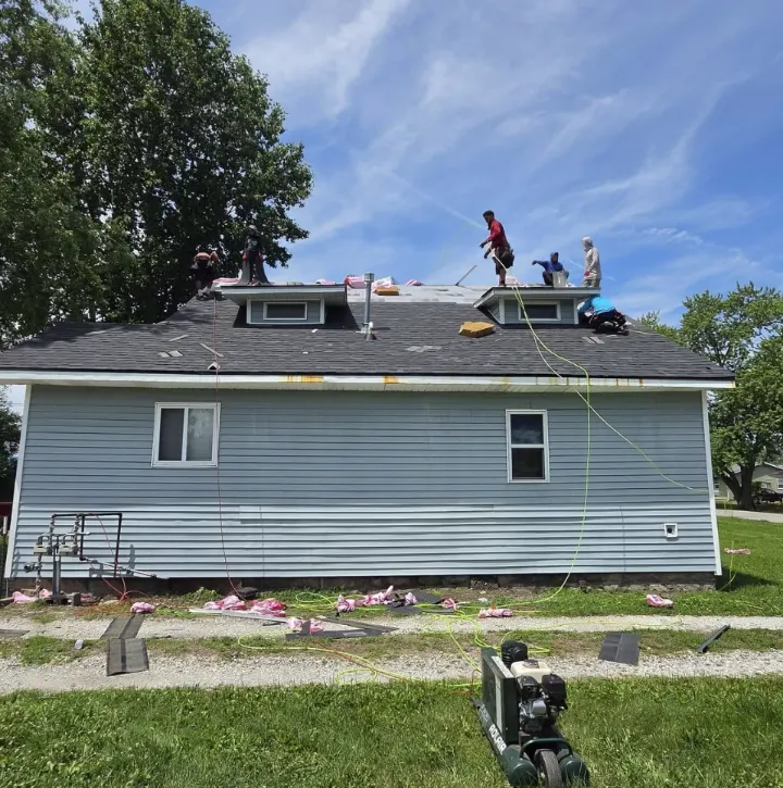 Storm damage roof inspection and repair crew working in Bismarck, North Dakota
